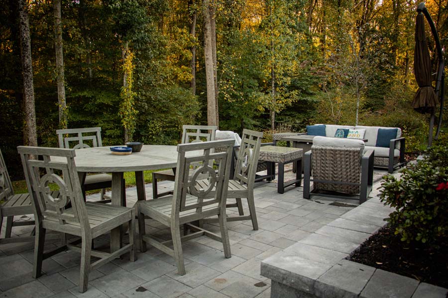 Patio with table, chairs, and couches