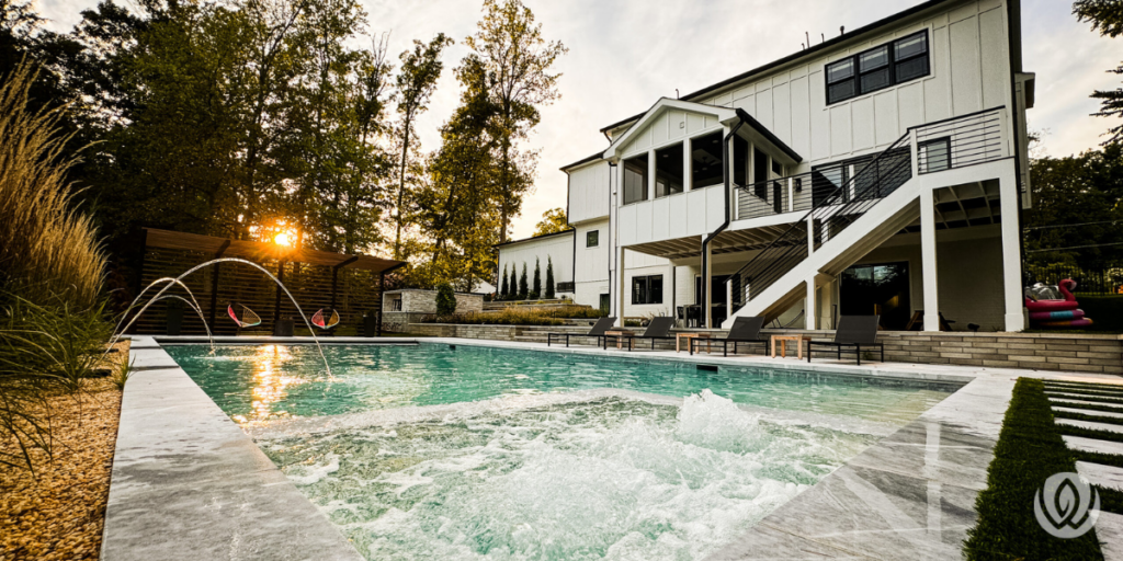 Custom pool beside modern home